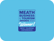 A blue badge on a light blue background reads: "MEATH BUSINESS & TOURISM AWARDS 2023 Winner! BEST TOURISM EXPERIENCE, Navan Adventure Centre.